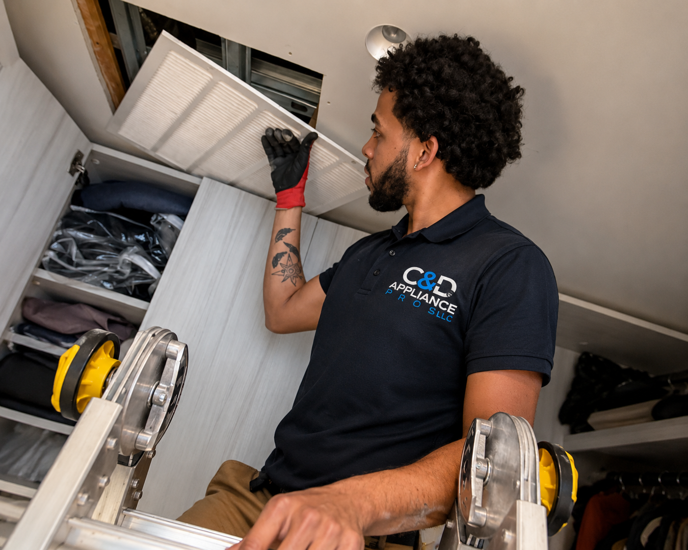 C&D Appliance Pros technician servicing a luxury New York kitchen